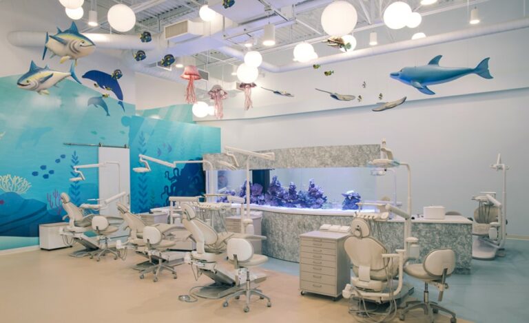 Hanging aquatic characters in dental treatment bay.