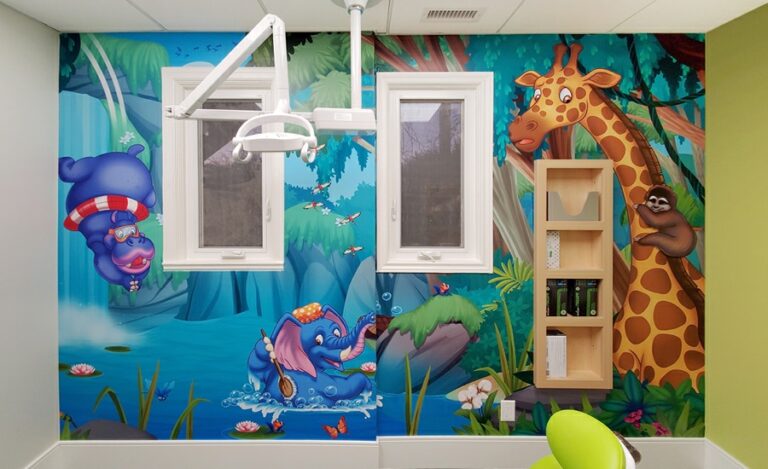 Kid-friendly jungle themed wall mural in a dental treatment room.