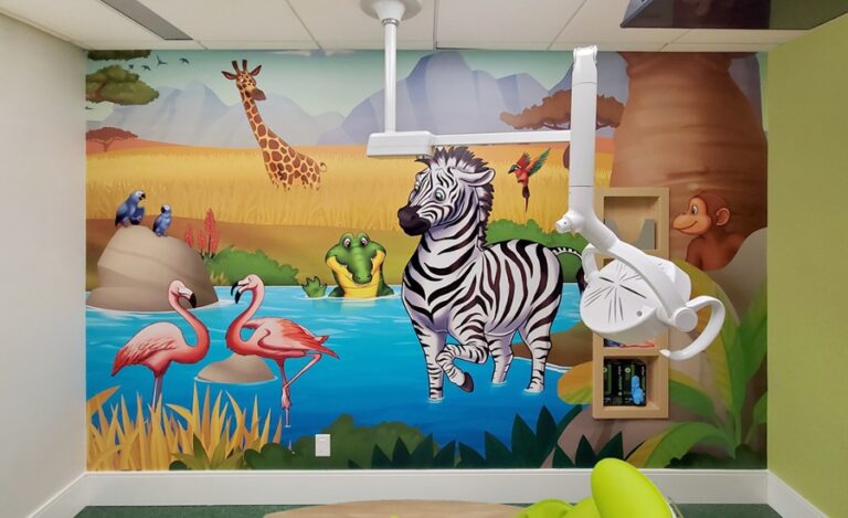 Kid-friendly safari themed wall mural in a dental treatment room.