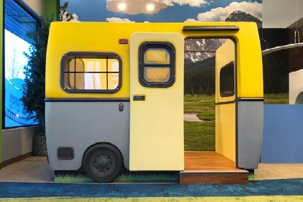Yellow and grey camper themed kids play house.