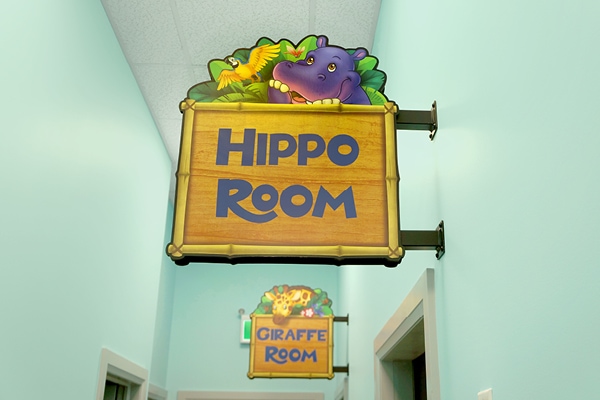 Wayfinding sign that reads "Hippo Room".